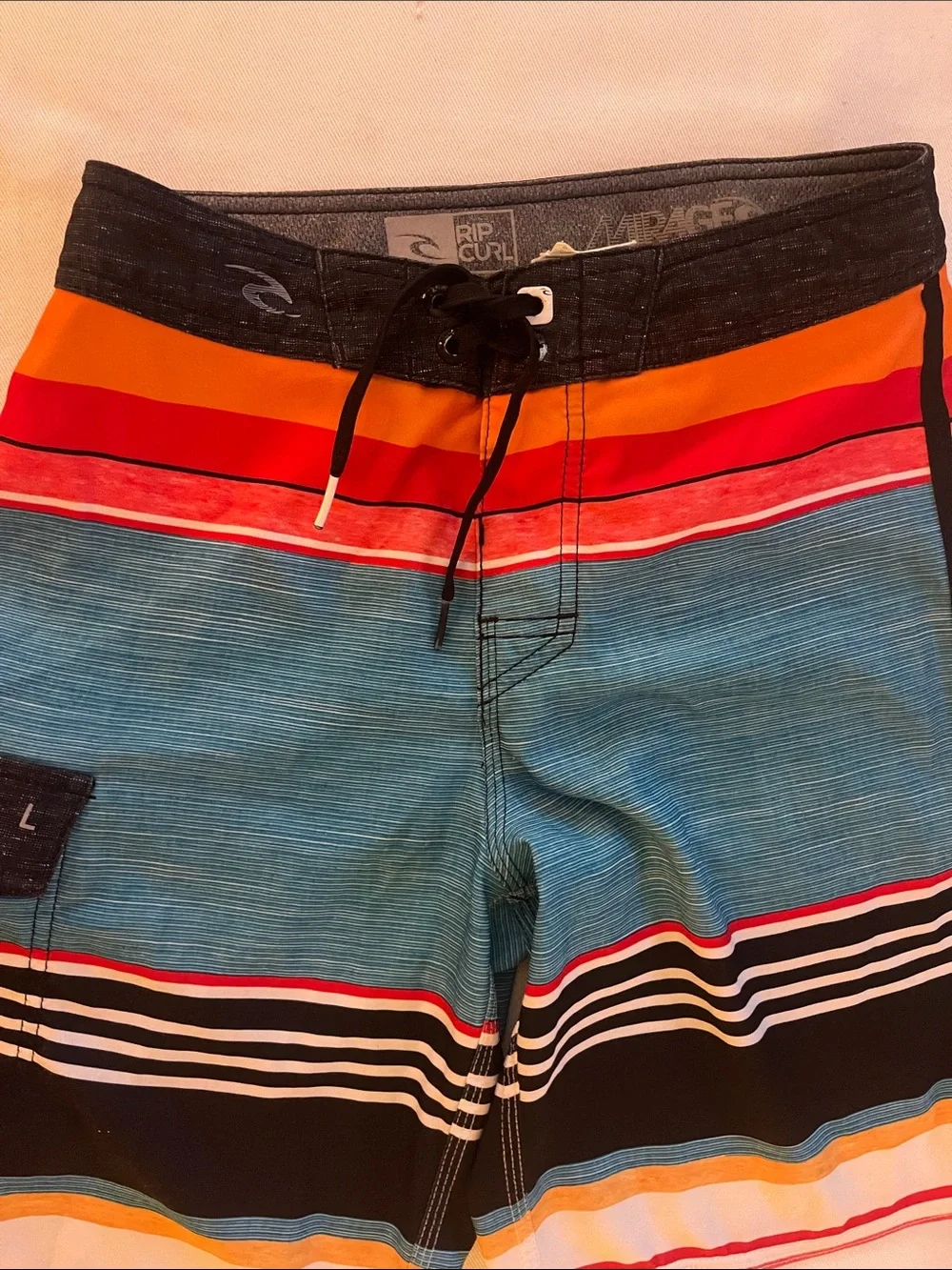 Rip Curl Boys Size 25 Blue Striped Boardshorts with Orange and Red Accents